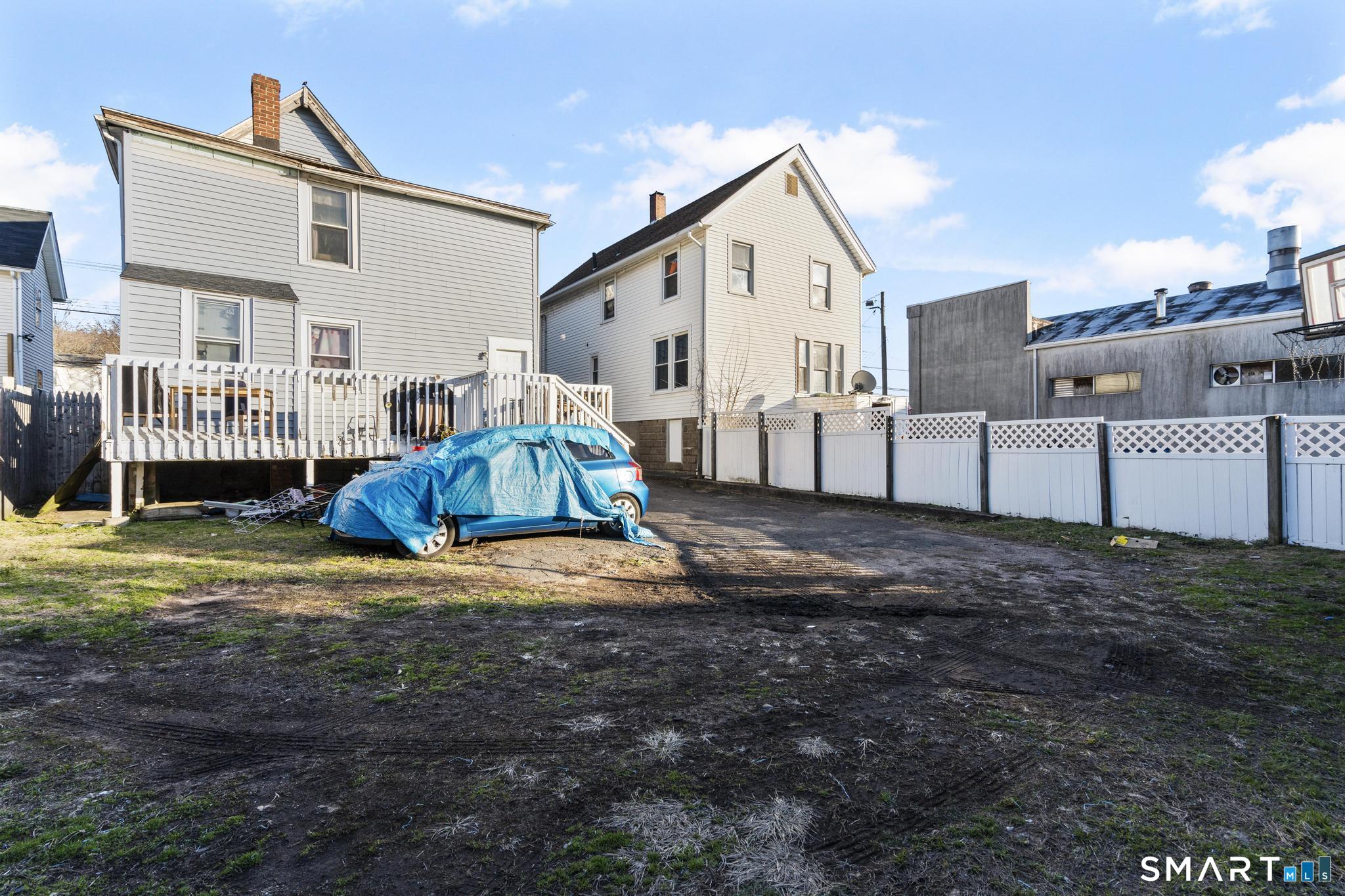 48 Fulton Street New Haven, CT 06513 - Photo 15 of 16 a view of a house with a yard