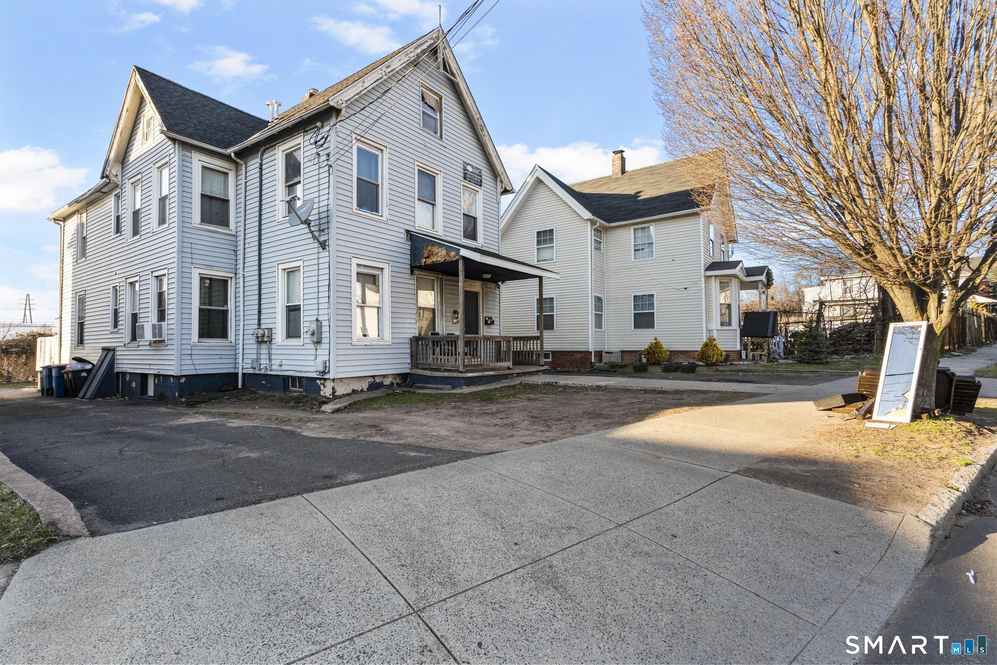 48 Fulton Street New Haven, CT 06513 - Photo 5 of 16 a view of a white building with a street