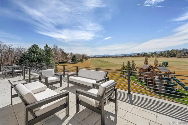 a view of a terrace with seating area