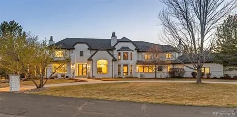 a front view of house with a yard