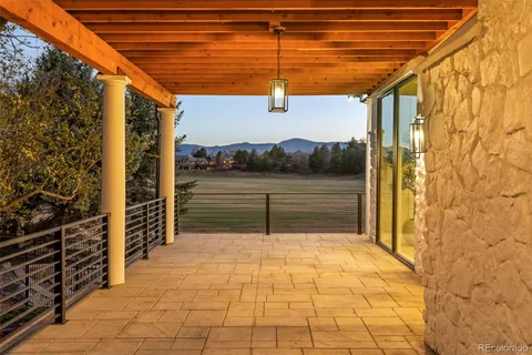 a view of a lake with furniture