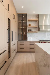 a view of counter top space and window in kitchen