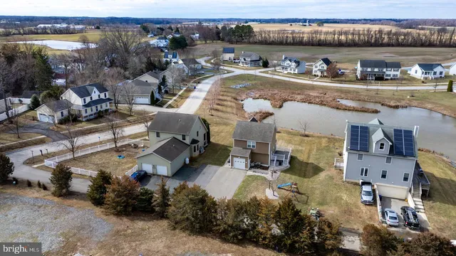 an aerial view of a house with outdoor space