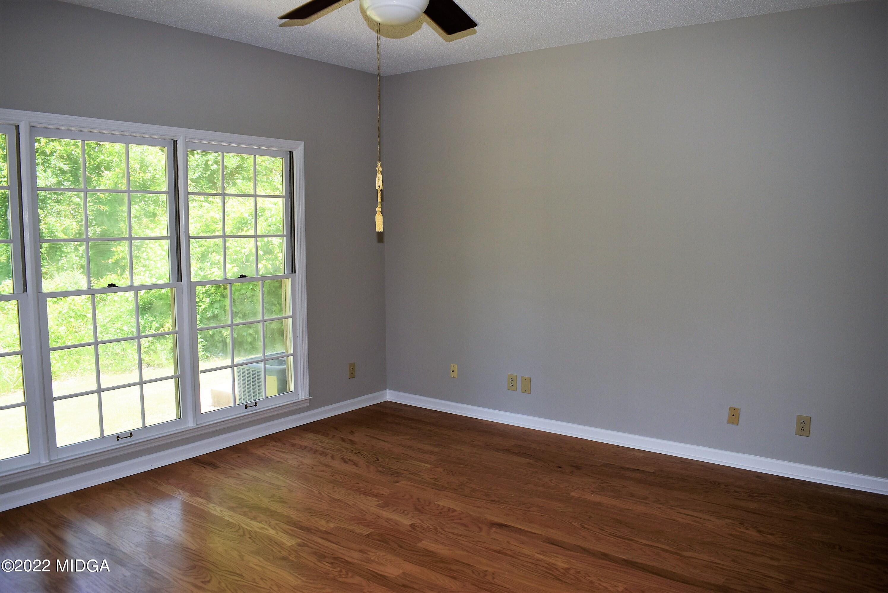914 Lundy Terrace Macon, GA 31210 - Photo 11 of 15 a view of a room with wooden floor and windows