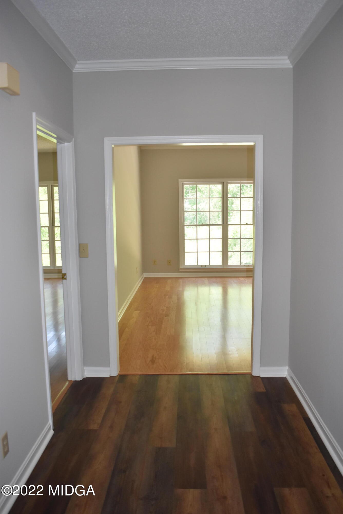 914 Lundy Terrace Macon, GA 31210 - Photo 2 of 15 a view of empty room with wooden floor and fan