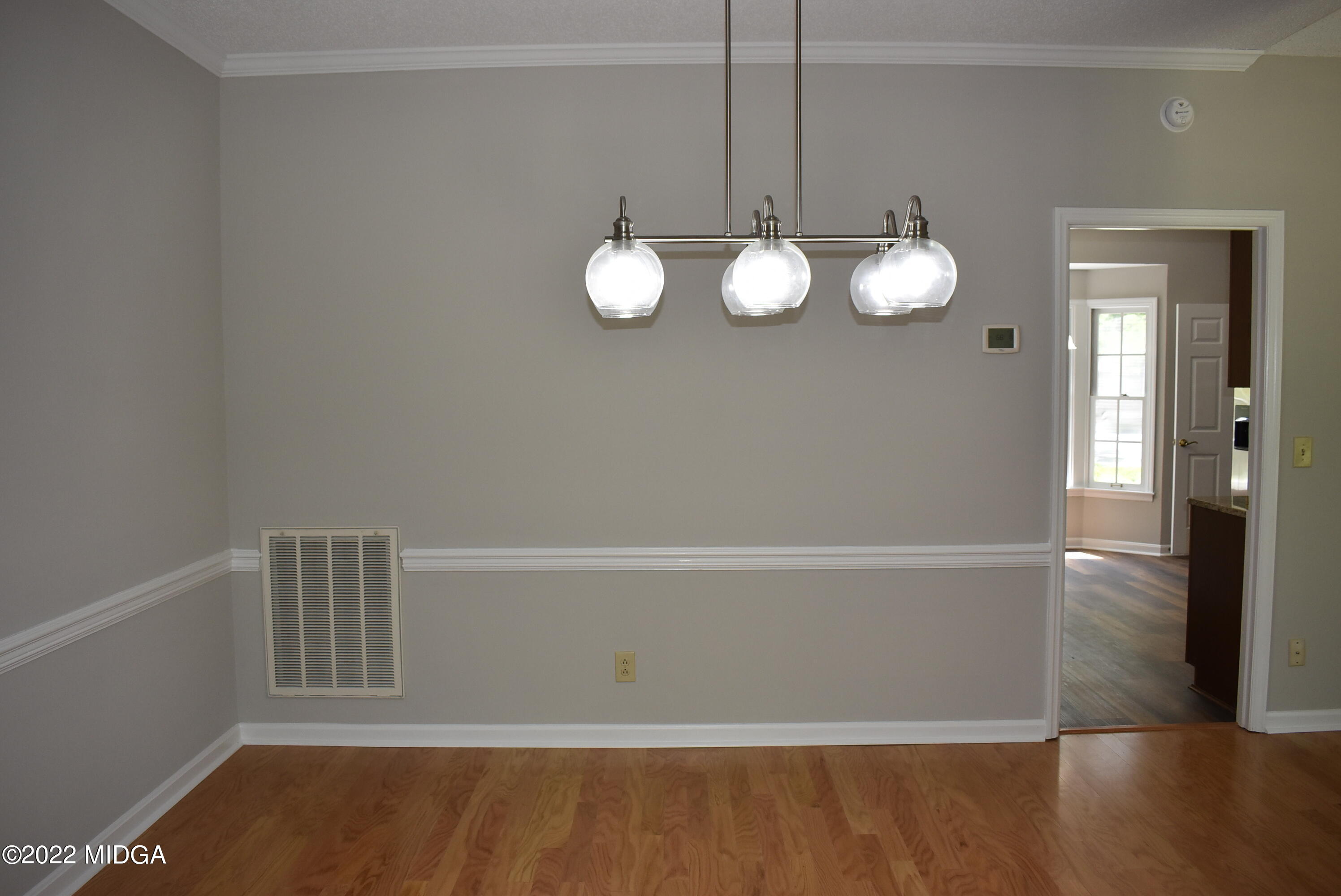914 Lundy Terrace Macon, GA 31210 - Photo 8 of 15 a view of cabinet with window and wooden floor