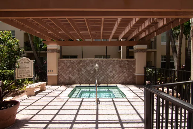 a backyard of a house with yard and outdoor seating