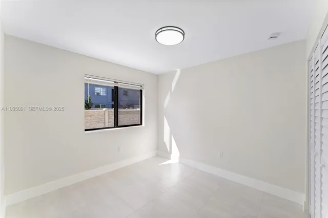 an empty room with closet