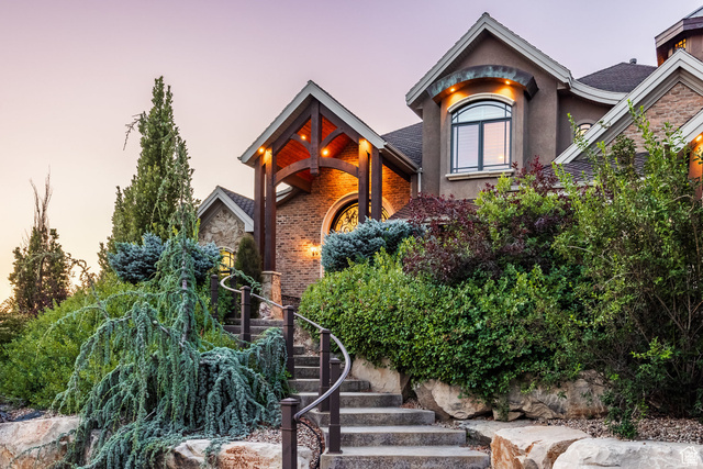 694 West Cephus Road Draper, UT 84020 - Photo 6 of 148 Staircase entry featuring wrought iron railings and stone steps