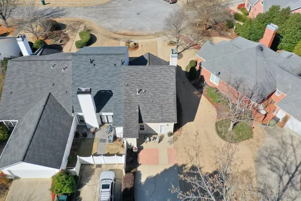 a picture of a building with a yard