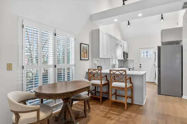 a view of a dining room with furniture