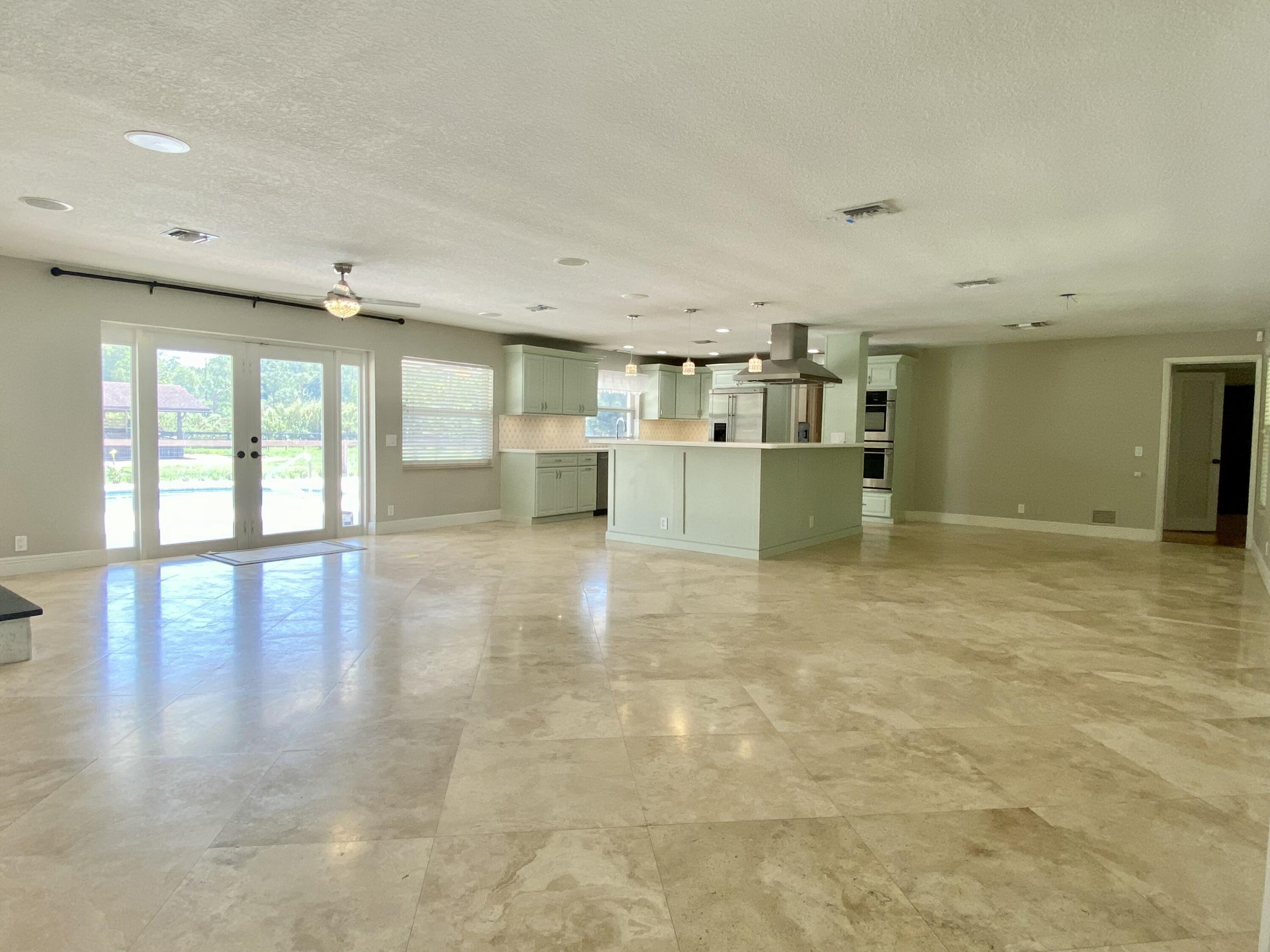 16605 115th Avenue North Jupiter, FL 33478 - Photo 20 of 54 a view of a kitchen with a sink