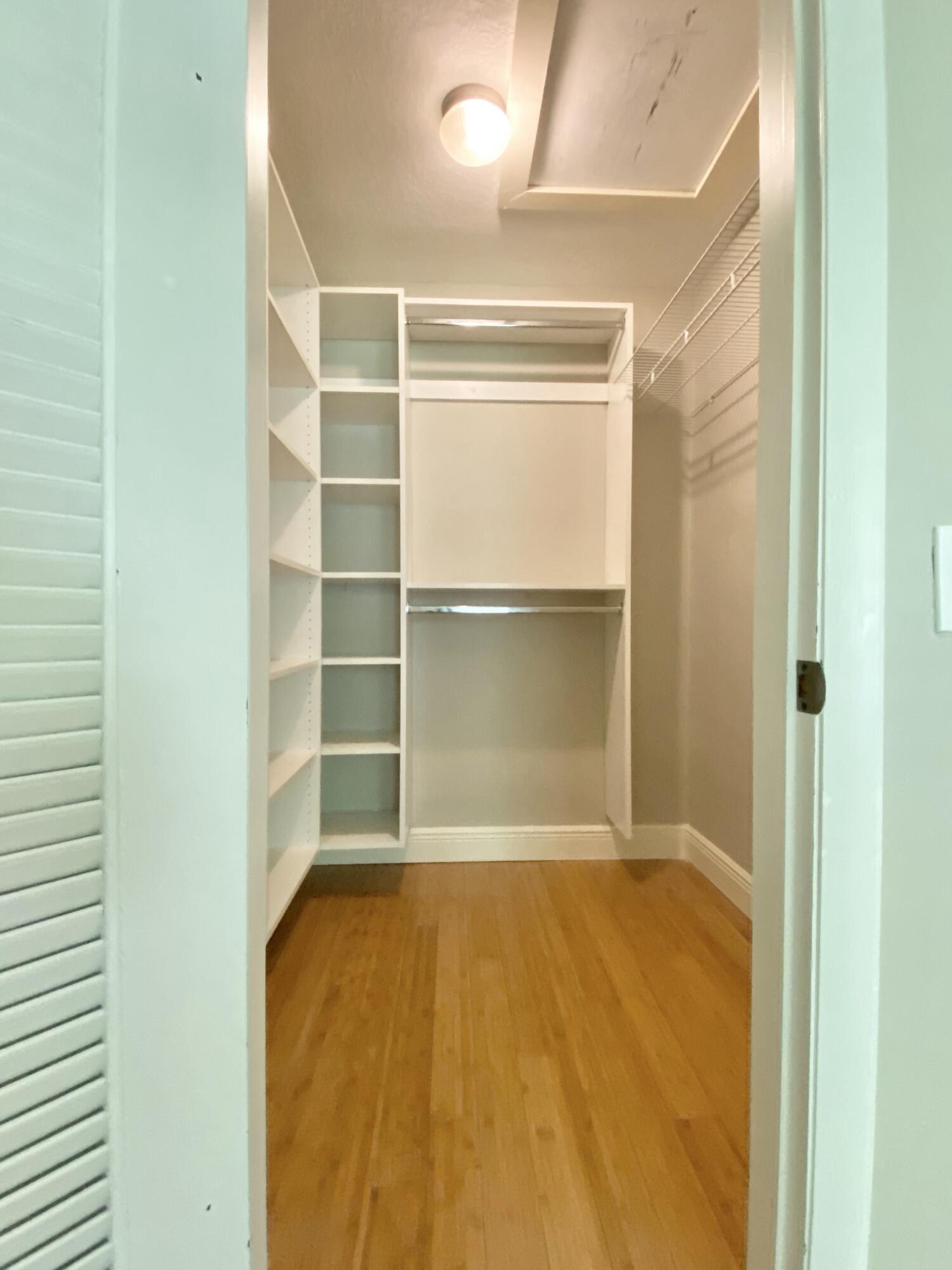 16605 115th Avenue North Jupiter, FL 33478 - Photo 32 of 54 a view of a room with empty racks