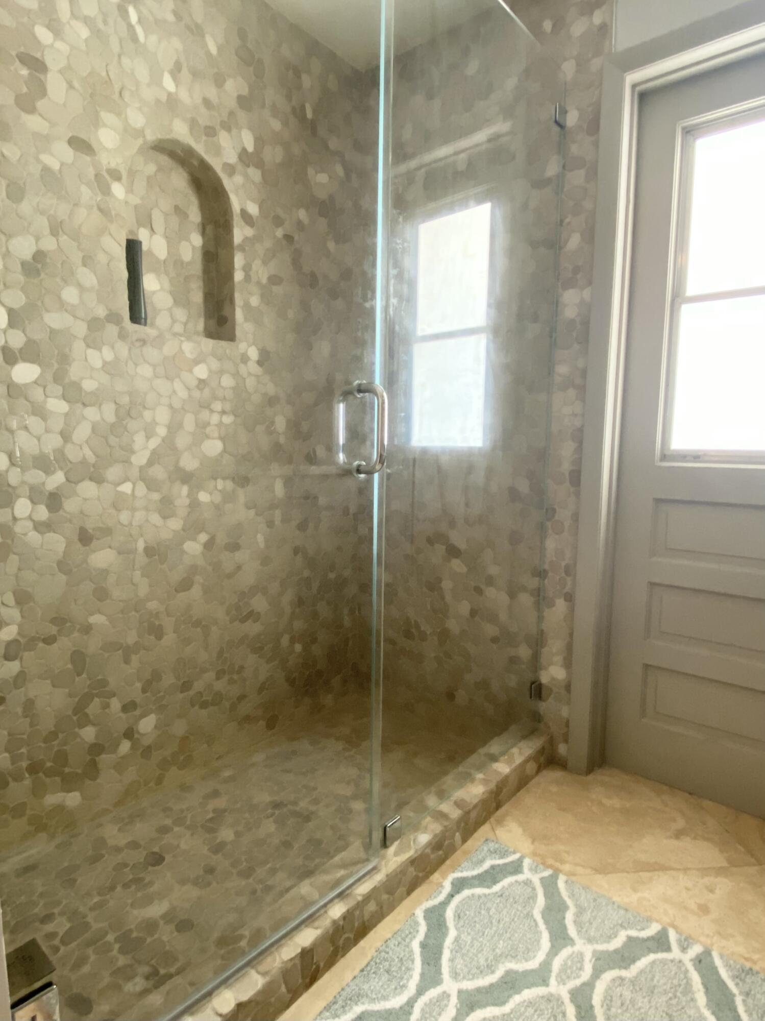 16605 115th Avenue North Jupiter, FL 33478 - Photo 36 of 54 a bathroom with a shower