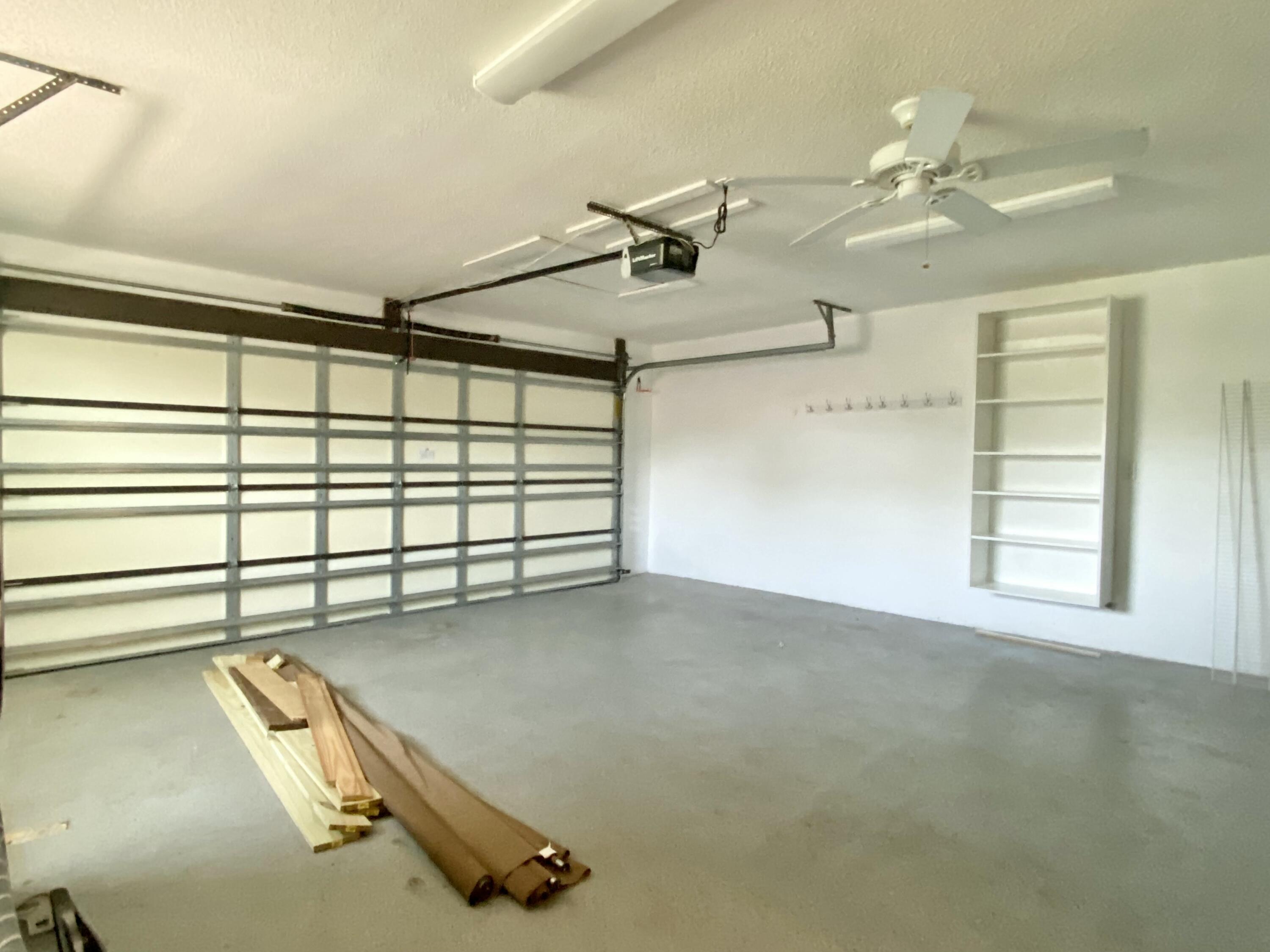 16605 115th Avenue North Jupiter, FL 33478 - Photo 39 of 54 en empty room with windows