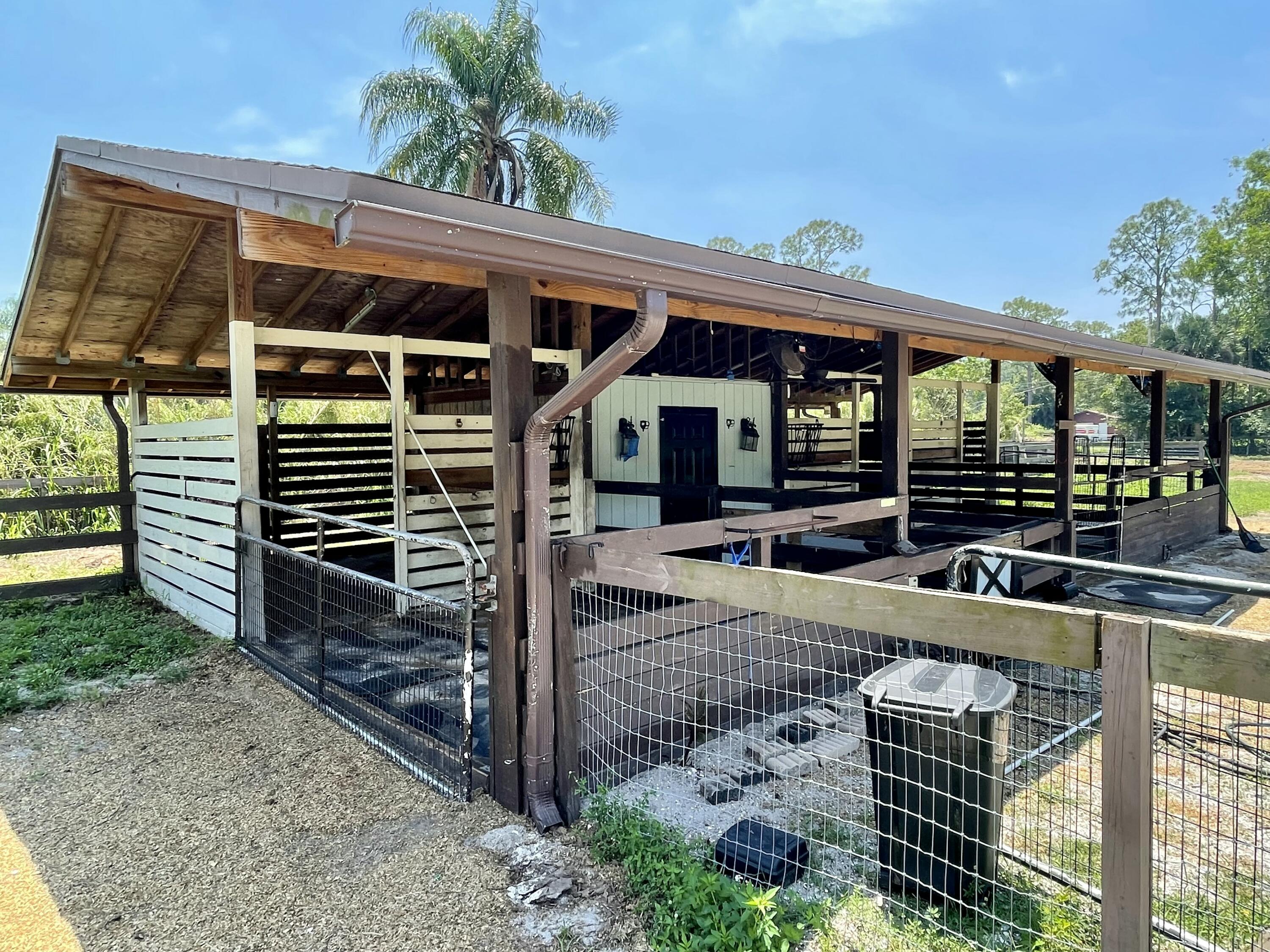 16605 115th Avenue North Jupiter, FL 33478 - Photo 46 of 54 a view of house with a large window