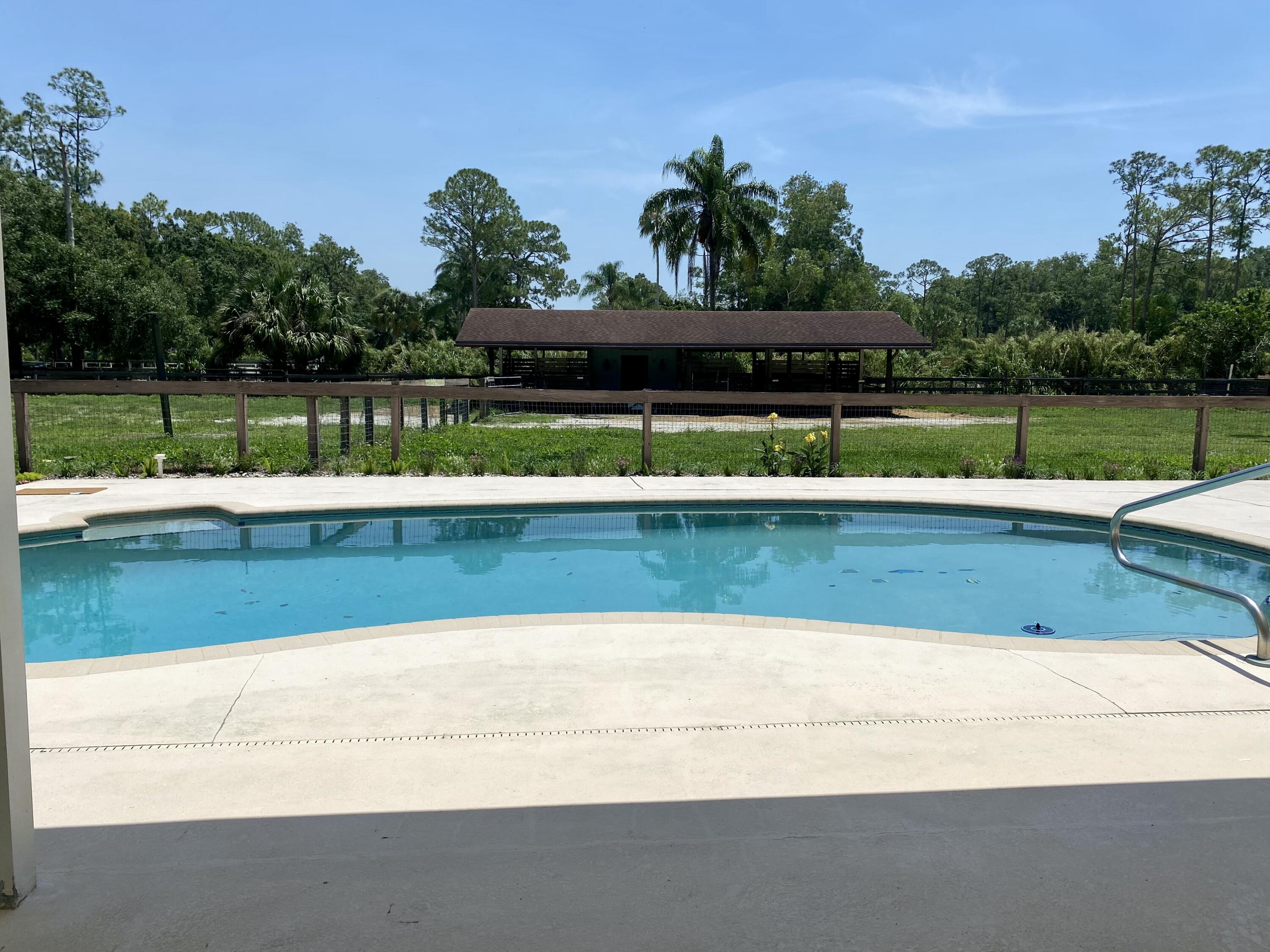 16605 115th Avenue North Jupiter, FL 33478 - Photo 5 of 54 a view of a yard