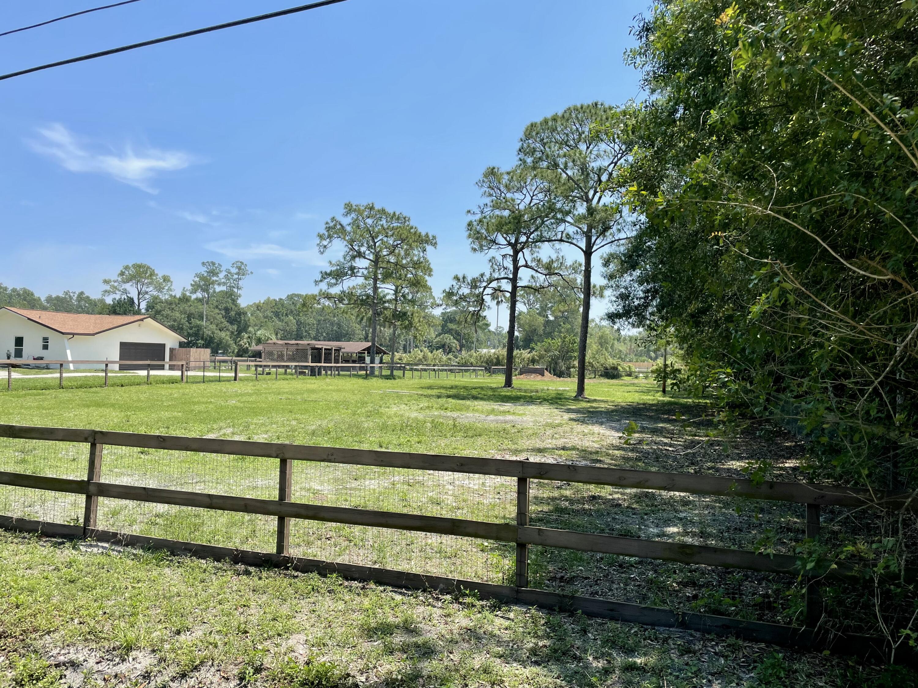 16605 115th Avenue North Jupiter, FL 33478 - Photo 51 of 54 a view of a park with large trees