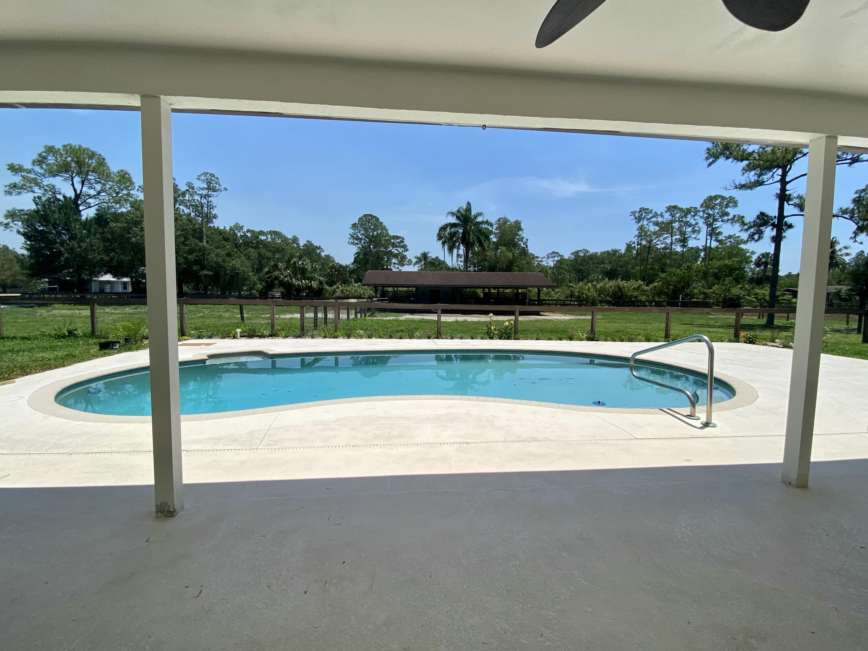 16605 115th Avenue North Jupiter, FL 33478 - Photo 6 of 54 a view of a park with slide