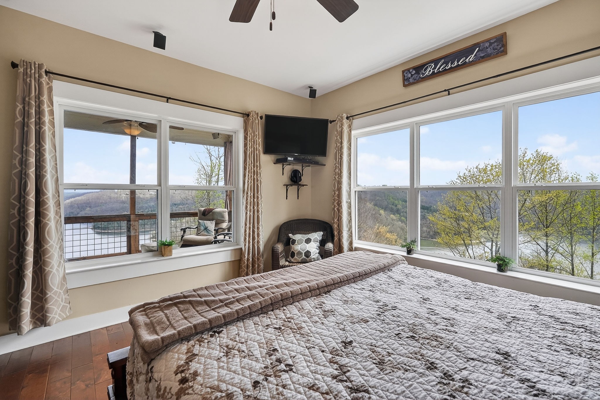 195 Coventry Way Smithville, TN 37166 - Photo 26 of 62 a bed sitting in a spacious bedroom next to a window