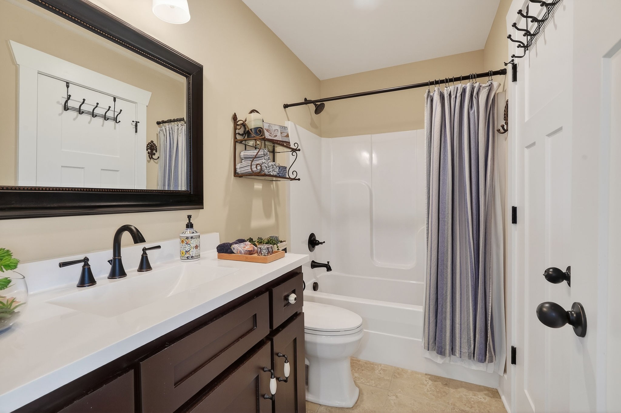 195 Coventry Way Smithville, TN 37166 - Photo 48 of 62 a bathroom with a sink a toilet and shower