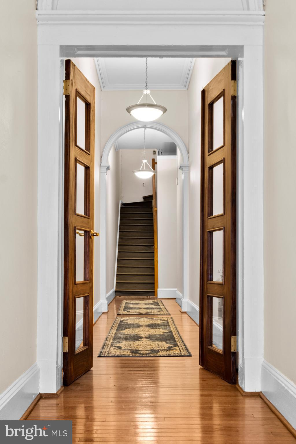 1121 Walnut Street Philadelphia, PA 19107 - Photo 15 of 38 a view of a hallway with wooden floor and staircase