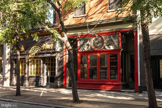 a view of street with sitting area