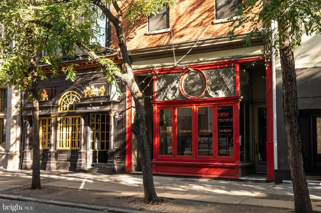 a view of street with sitting area