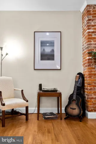 a bathroom with a granite countertop toilet and a shower