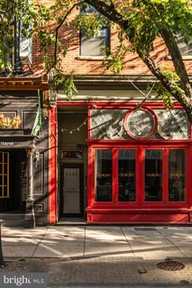 a picture of a room with furniture and a window