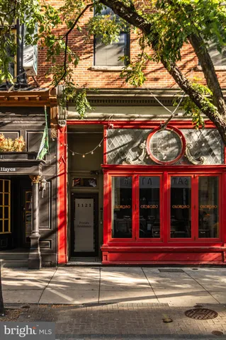 a picture of a room with furniture and a window