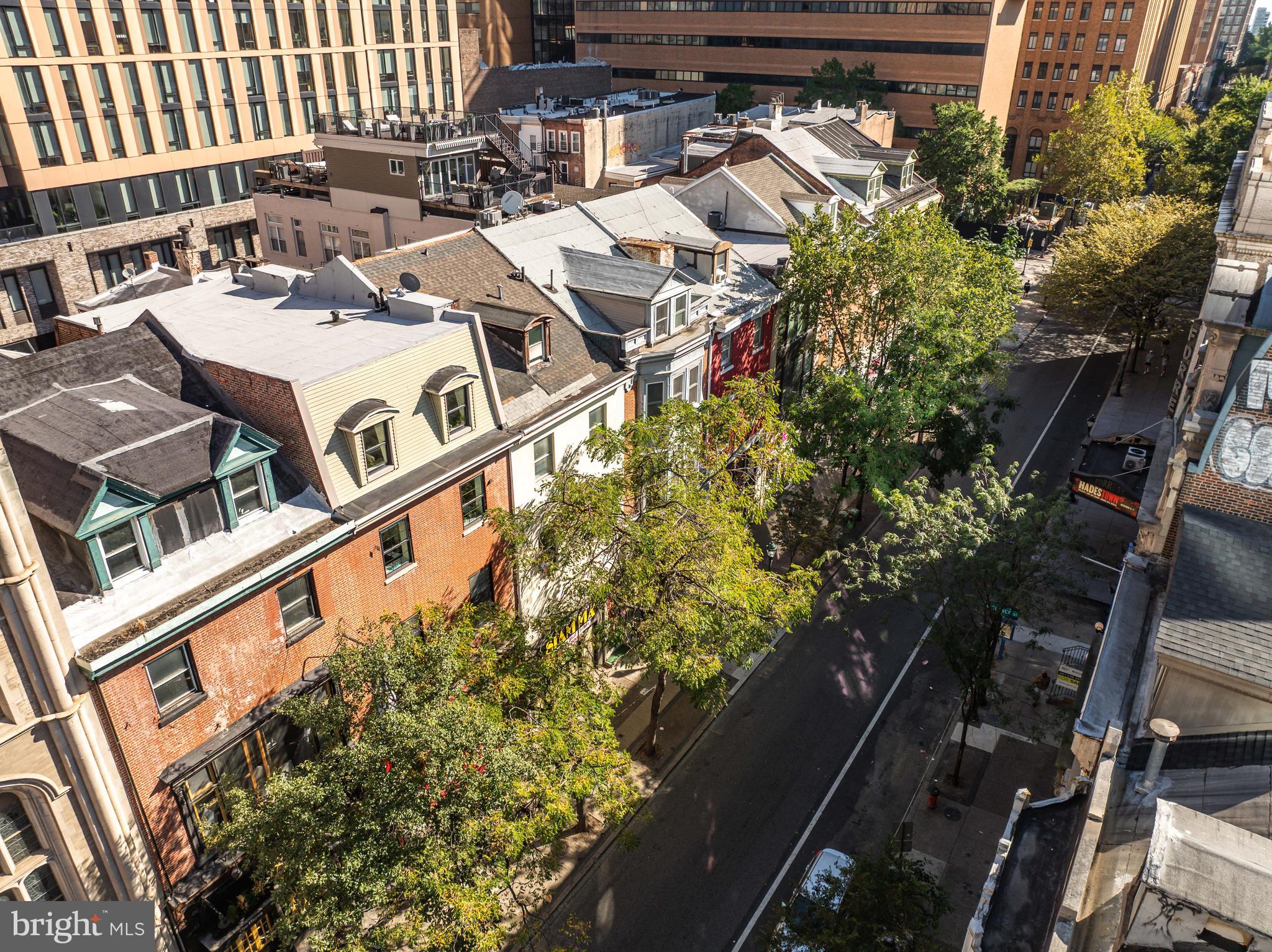 1121 Walnut Street Philadelphia, PA 19107 - Photo 10 of 38 an aerial view of a house with a yard and balcony