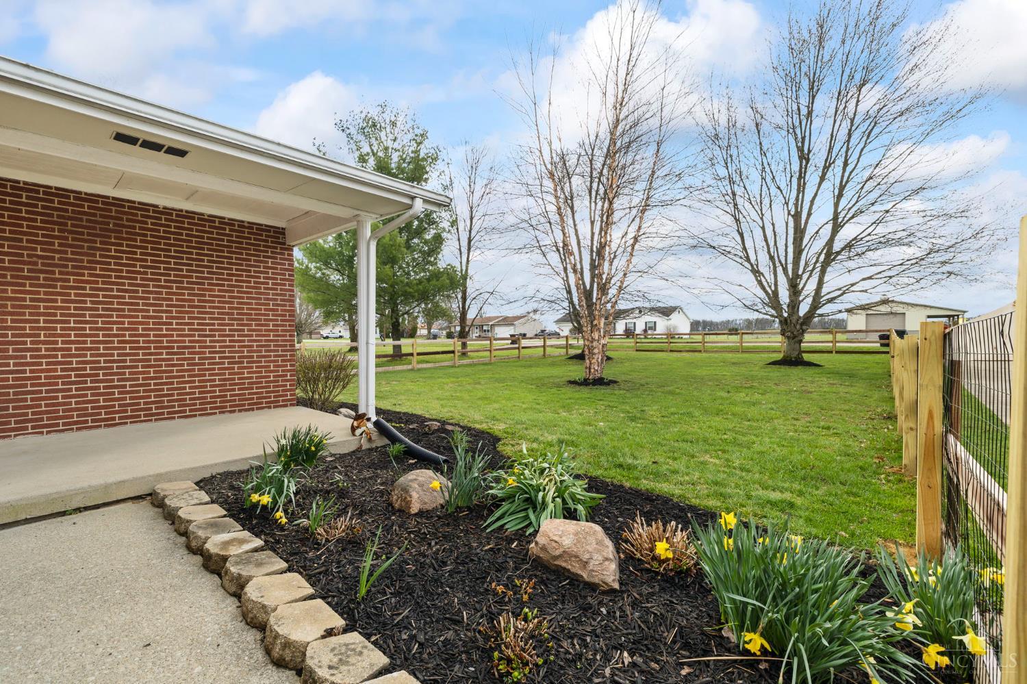 7306 Fairground Road Blanchester, OH 45107 - Photo 4 of 41 Beautiful, shaded and fully fenced front yard.