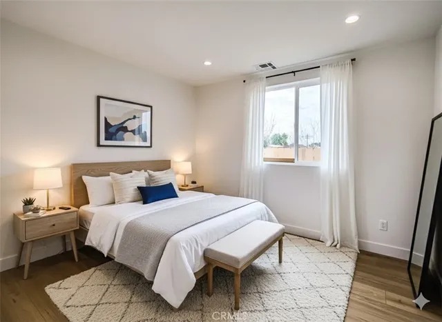 a view of front door with wooden floor