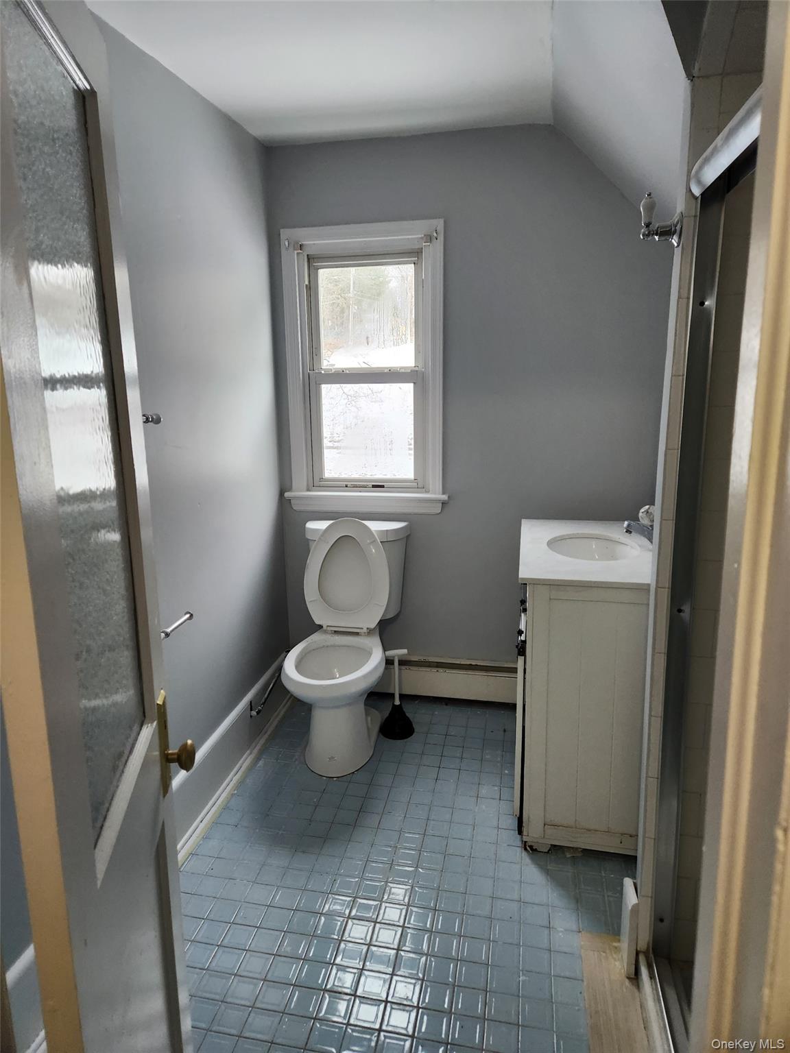 72 Stanton Corner Road, Unit 2 Swan Lake, NY 12783 - Photo 4 of 7 a bathroom with a toilet and a shower