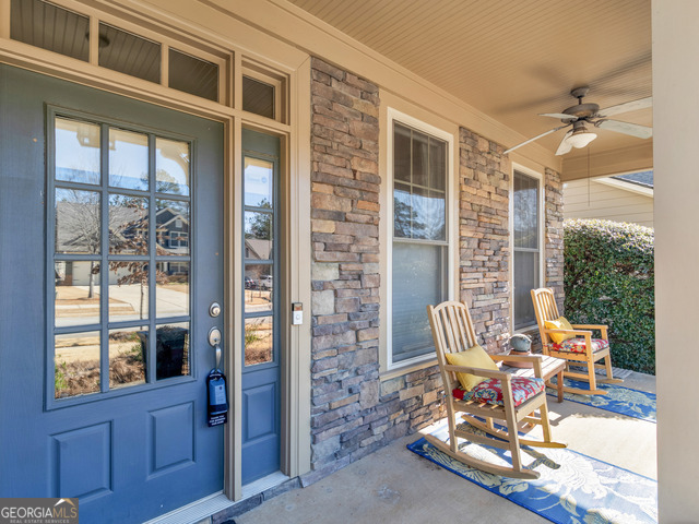 1141 Pebble Creek Lane Locust Grove, GA 30248 - Photo 2 of 14 Rocking Chair Front Porch