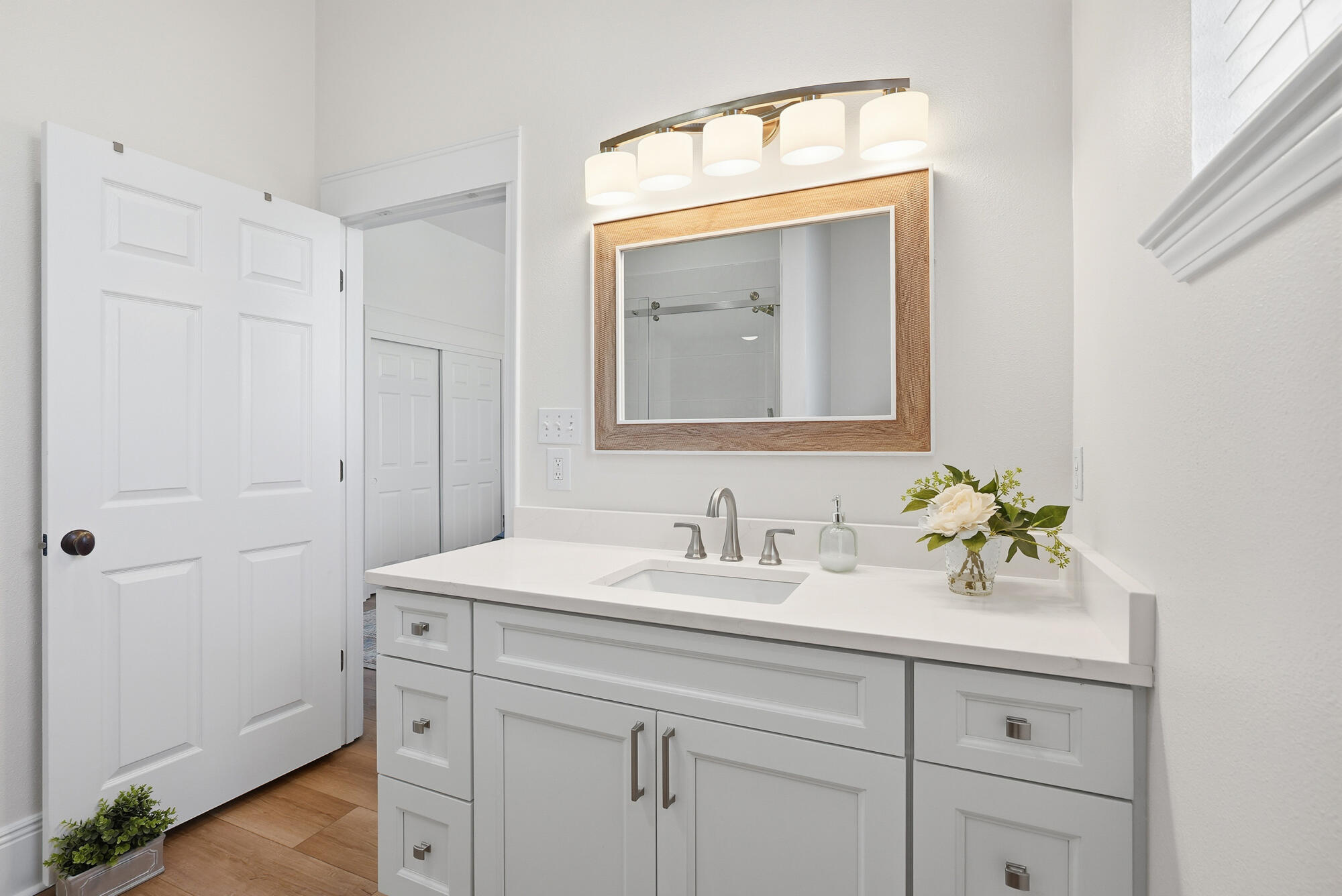 122 Shorebird Drive, Unit 821 Santa Rosa Beach, FL 32459 - Photo 16 of 36 a bathroom with a sink a vanity and a mirror