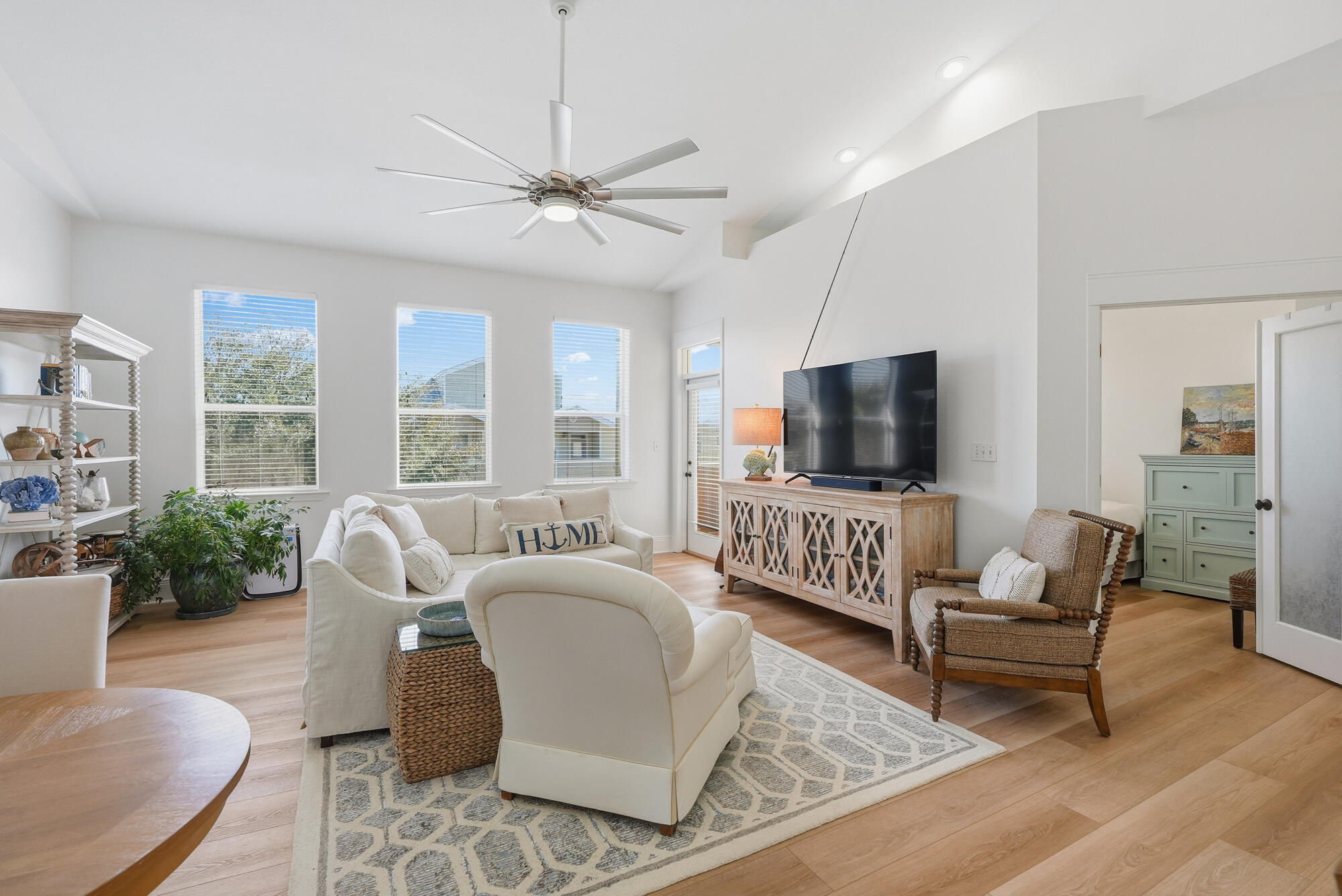 122 Shorebird Drive, Unit 821 Santa Rosa Beach, FL 32459 - Photo 3 of 36 a living room with furniture and a flat screen tv