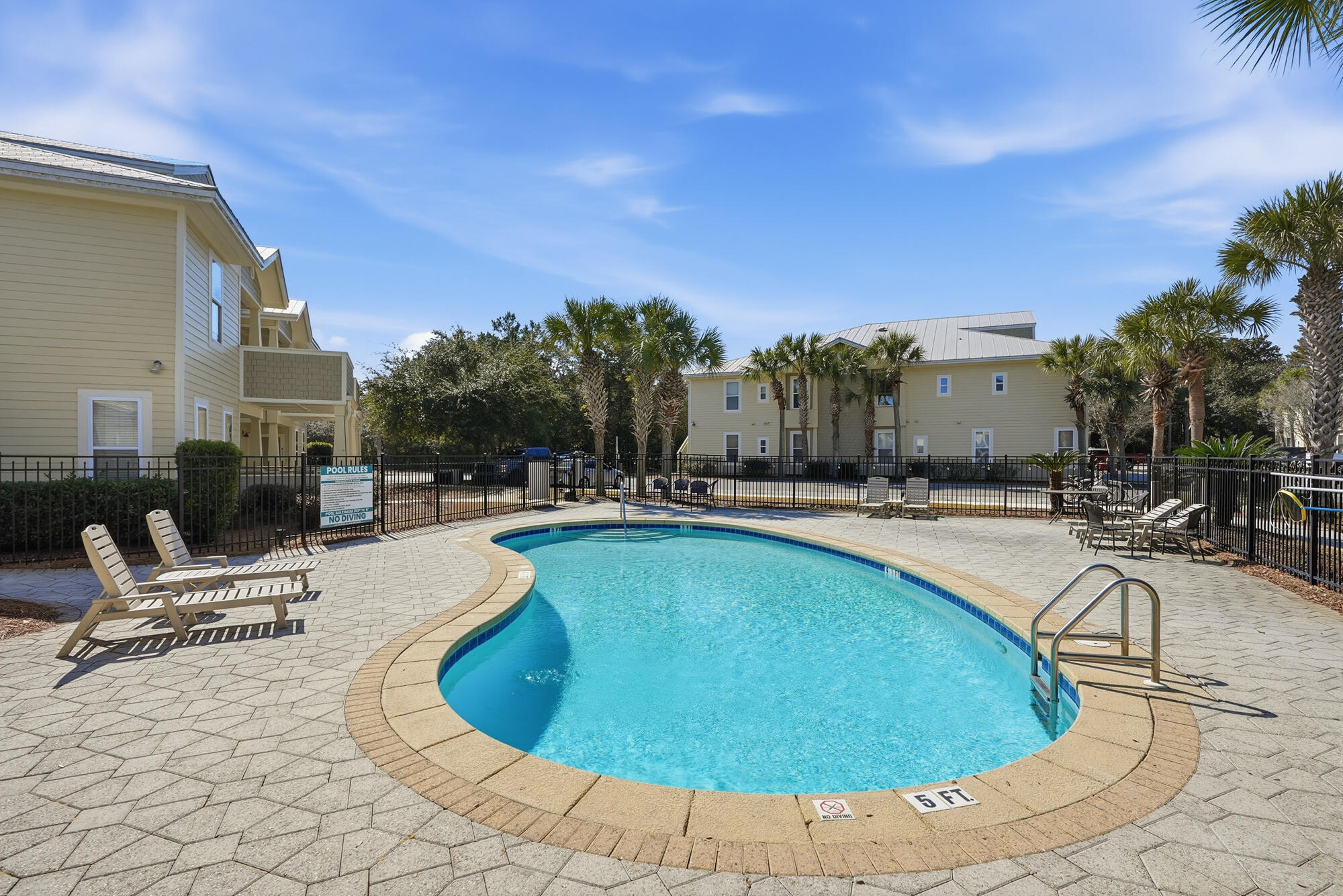 122 Shorebird Drive, Unit 821 Santa Rosa Beach, FL 32459 - Photo 35 of 36 a view of a swimming pool with outdoor seating