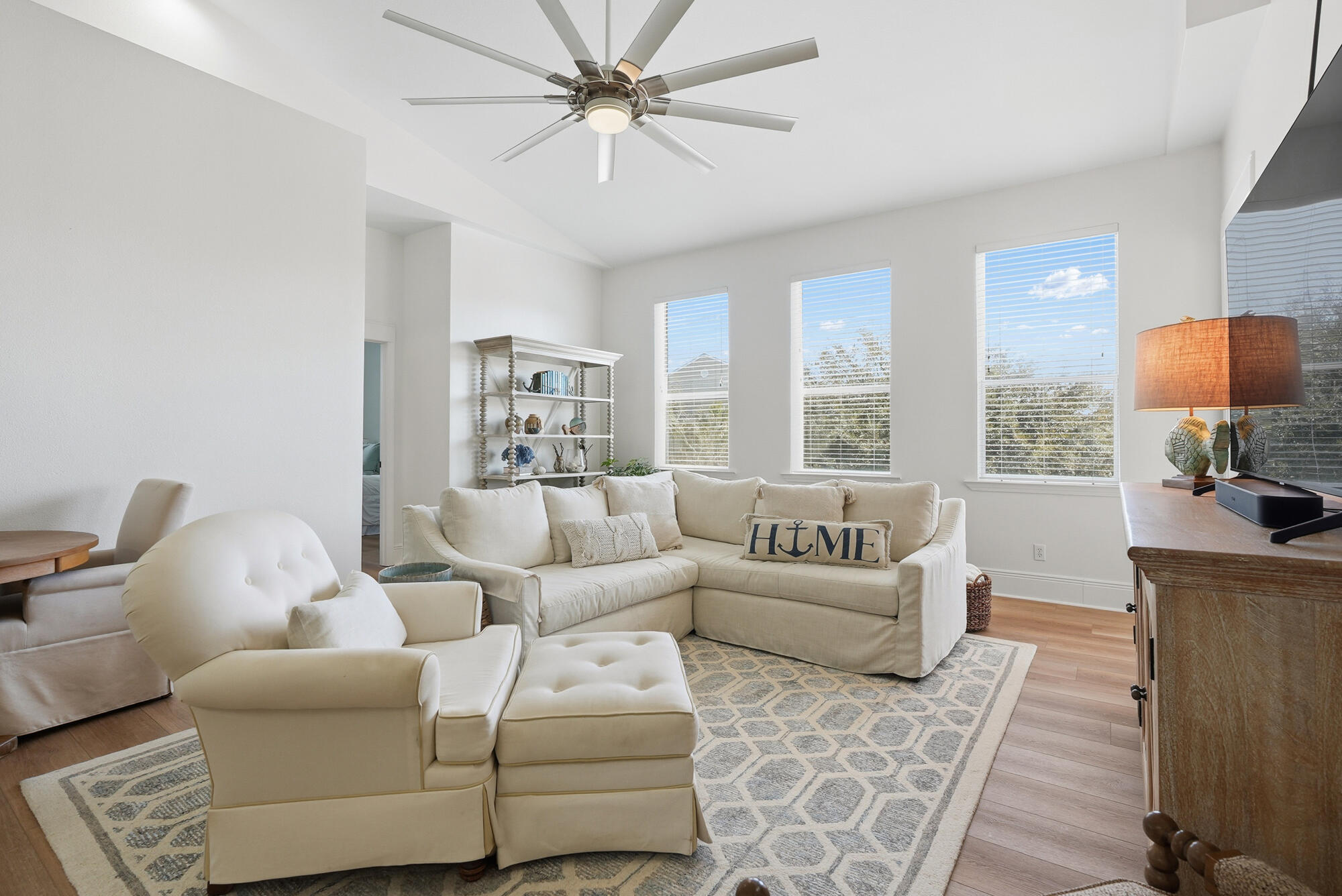 122 Shorebird Drive, Unit 821 Santa Rosa Beach, FL 32459 - Photo 4 of 36 a living room with furniture and a large window