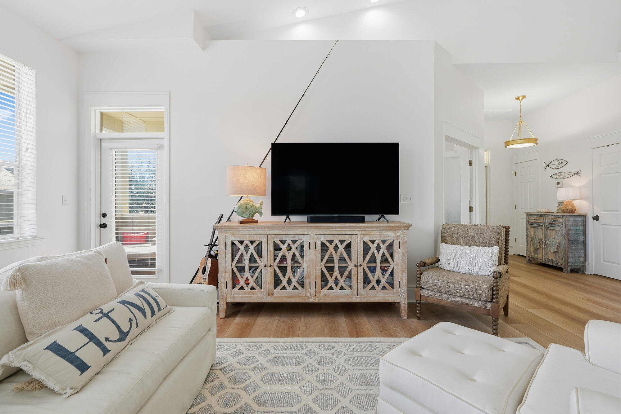 122 Shorebird Drive, Unit 821 Santa Rosa Beach, FL 32459 - Photo 6 of 36 a living room with furniture and a flat screen tv