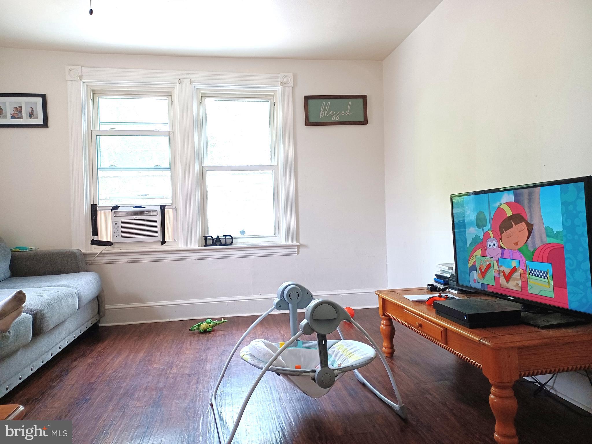 43 West Ferdinand Street Manheim, PA 17545 - Photo 6 of 23 a living room with furniture and window