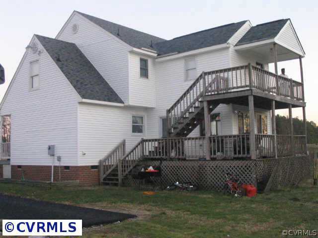 5700 Trinity Church Road Church Road, VA 23833 - Photo 4 of 6 a front view of a house with a garden