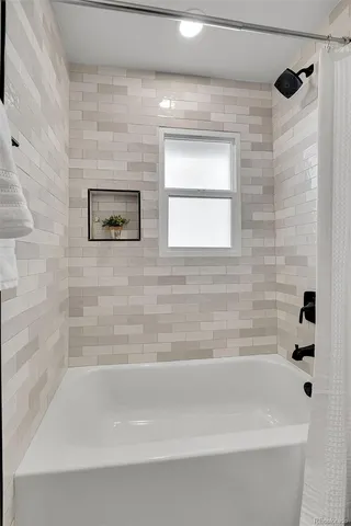 a bathroom with a bathtub