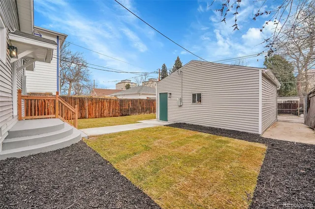 a bathroom with a sink and a yard