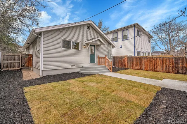 a view of backyard of house