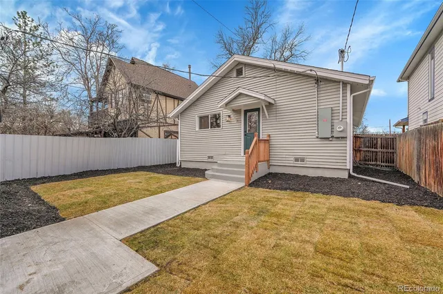 a view of a backyard of house