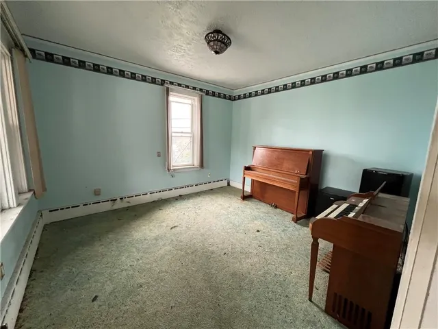 a room with windows and closet