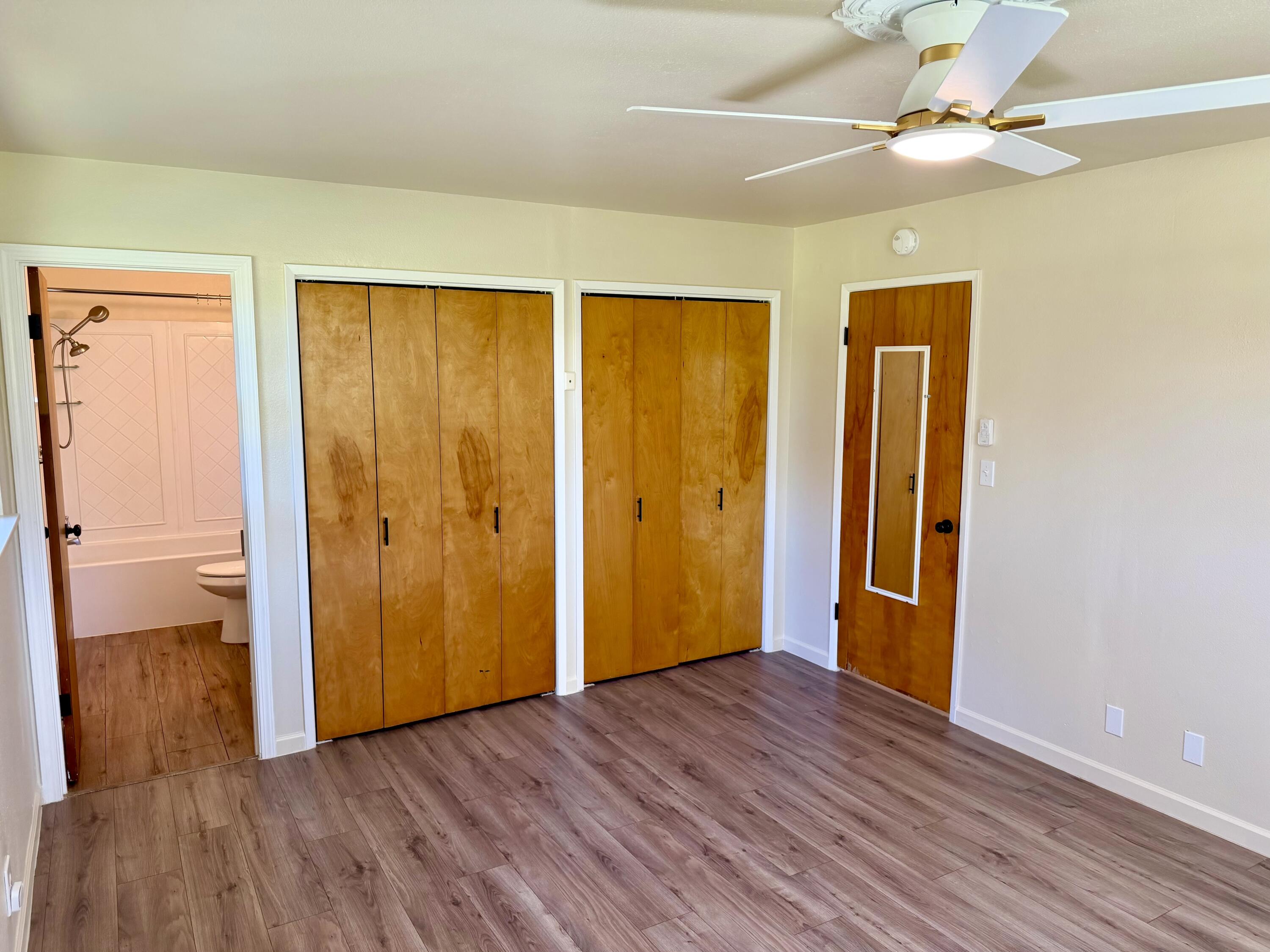 5572 Olive Street Anderson, CA 96007 - Photo 21 of 35 a view of an empty room with wooden floor