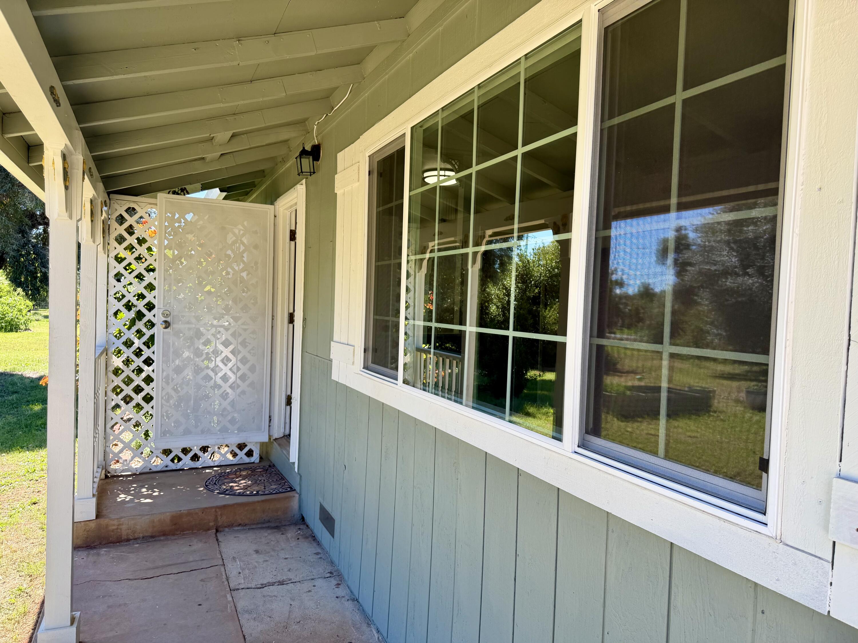 5572 Olive Street Anderson, CA 96007 - Photo 6 of 35 a view of a door and a window